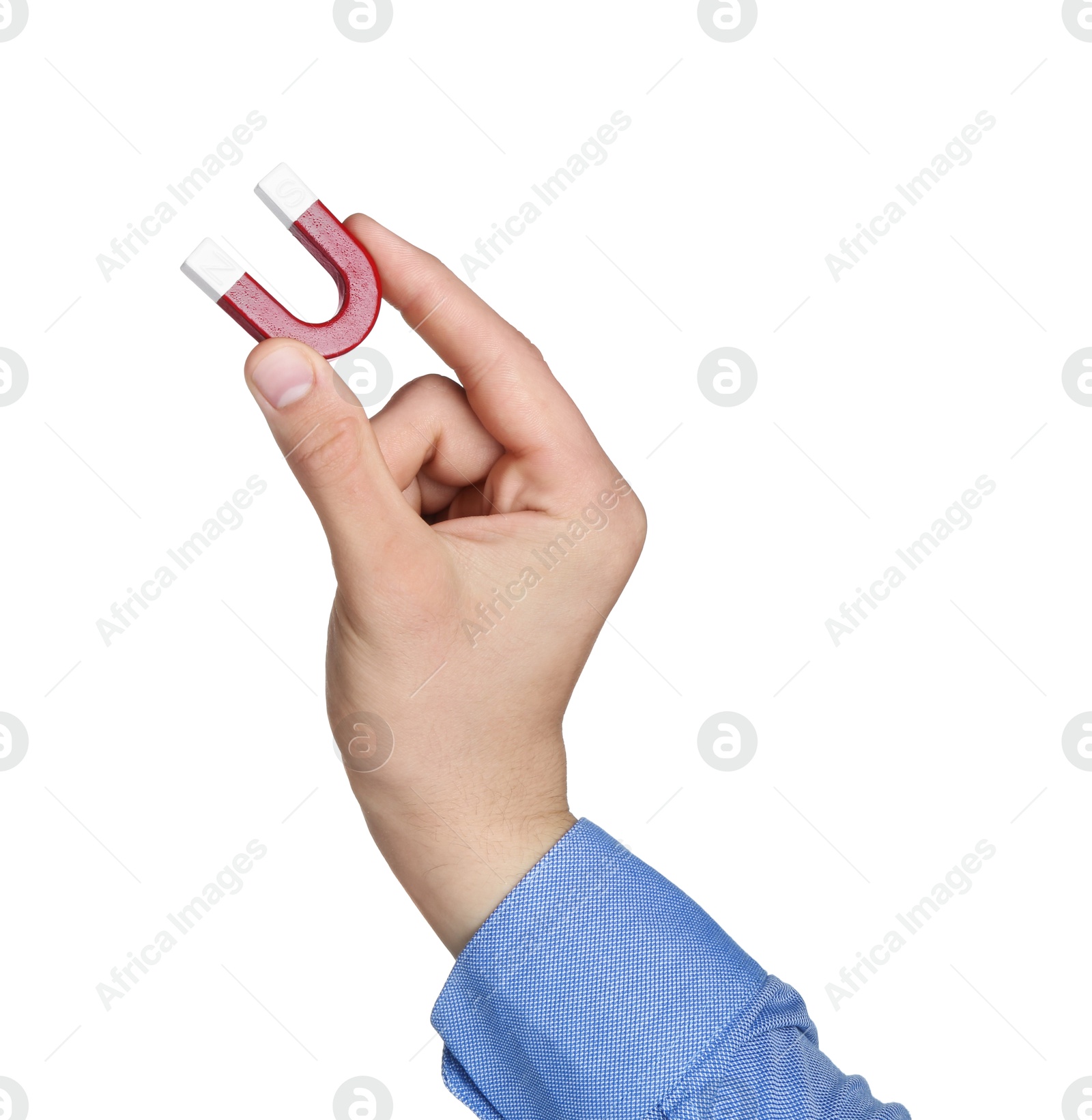 Photo of Man with horseshoe magnet on white background, closeup