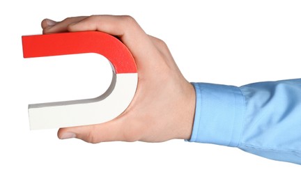 Photo of Man with horseshoe magnet on white background, closeup