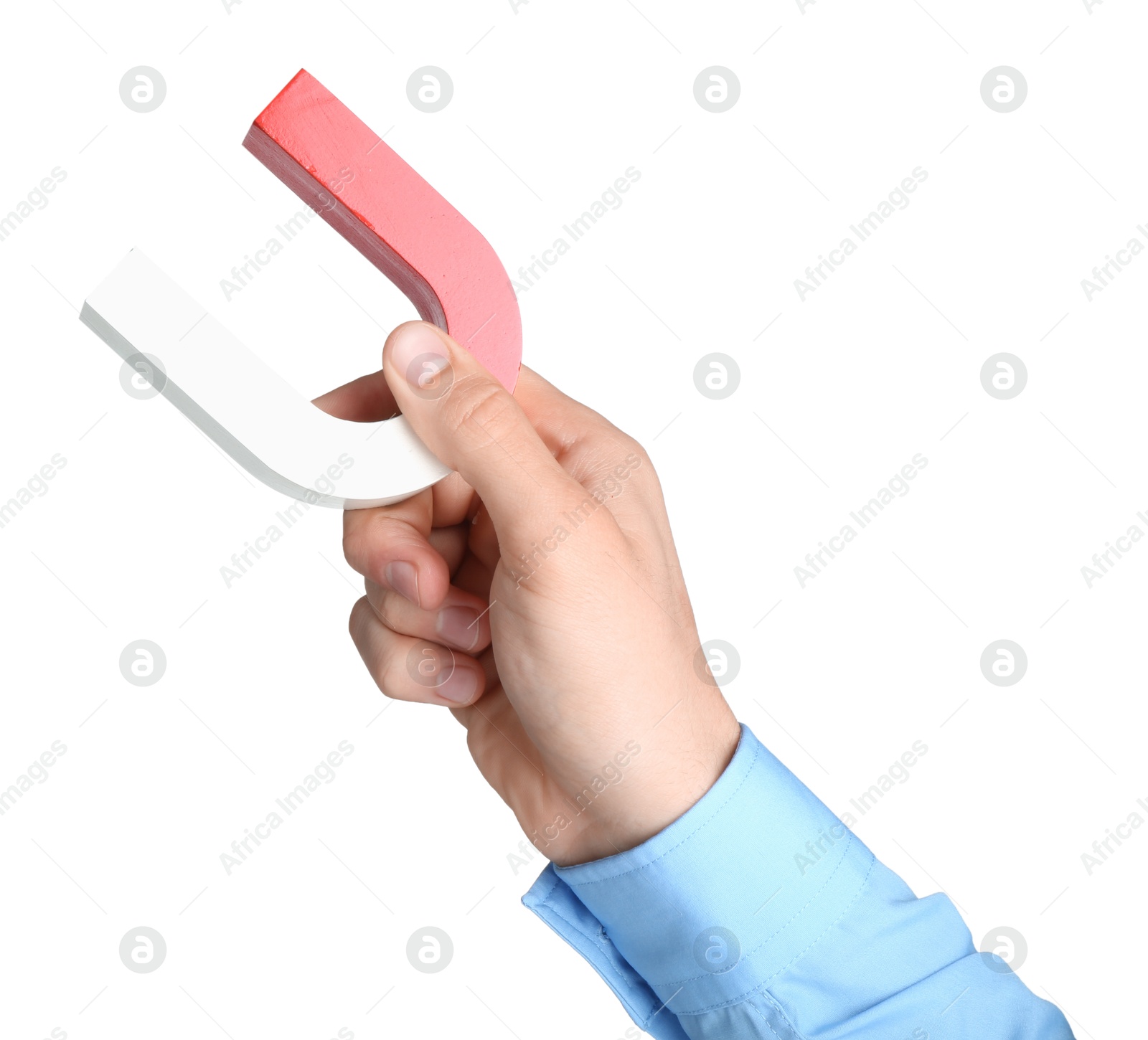 Photo of Man with horseshoe magnet on white background, closeup