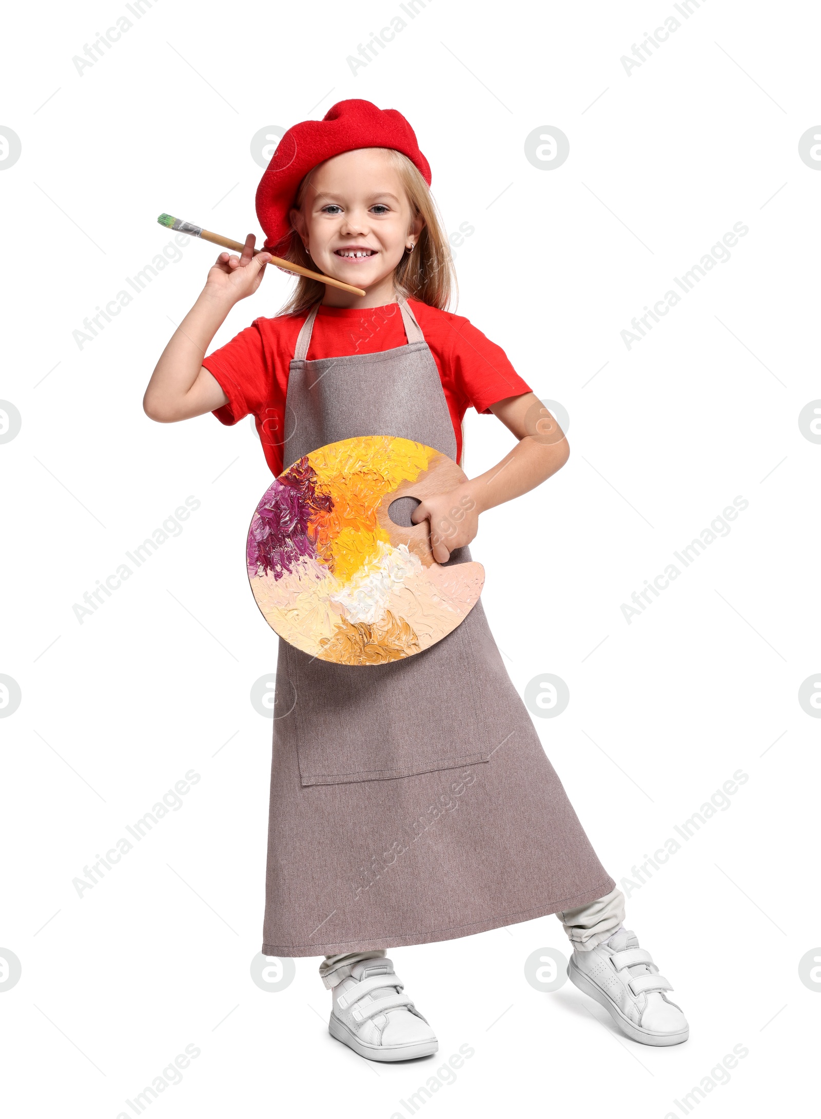 Photo of Little girl with brush and palette pretending to be artist on white background. Dreaming of future profession