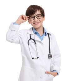 Photo of Boy with stethoscope pretending to be doctor on white background. Dreaming of future profession