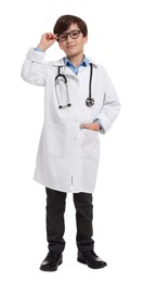 Photo of Boy with stethoscope pretending to be doctor on white background. Dreaming of future profession