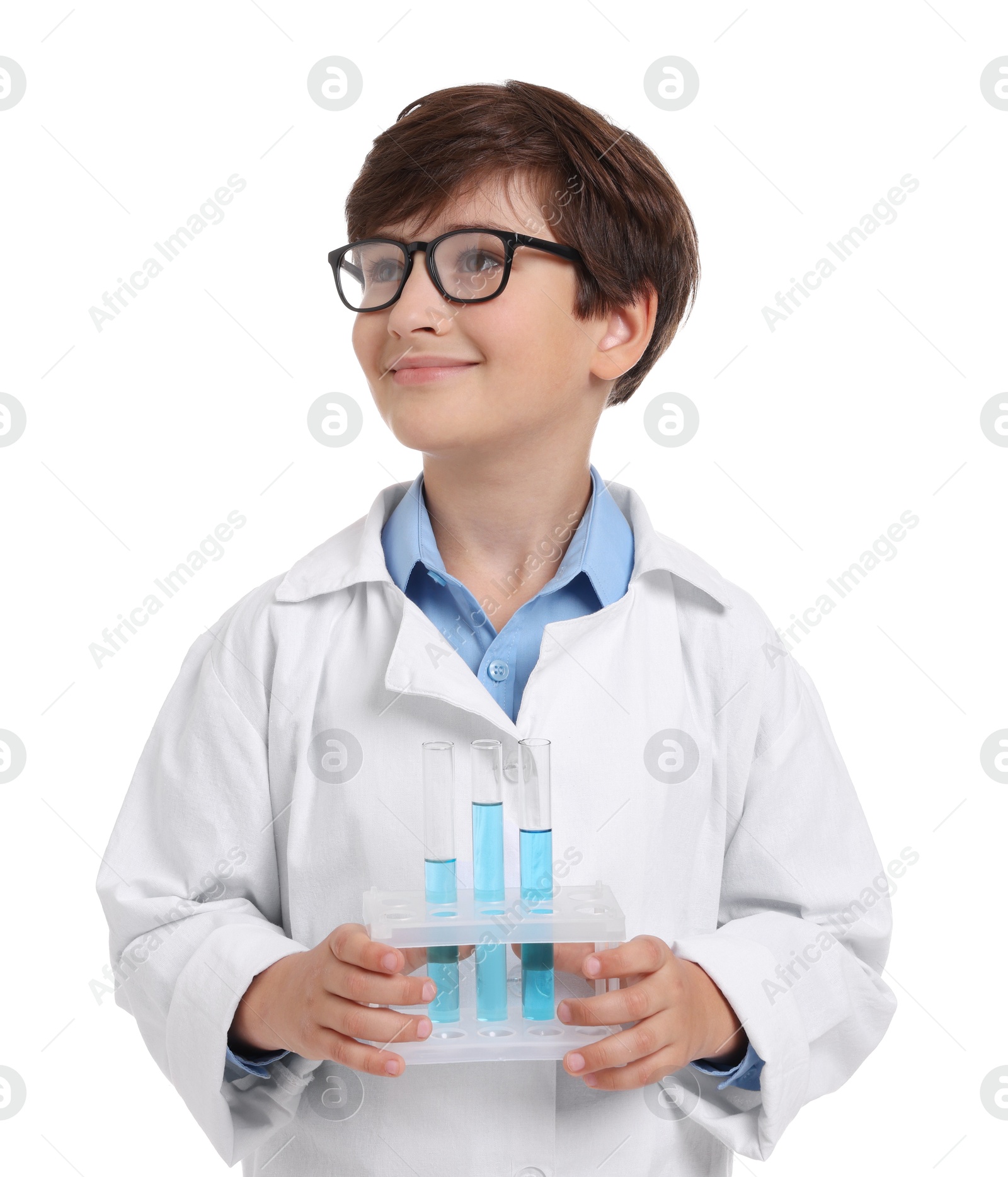 Photo of Boy with test tubes pretending to be scientist on white background. Dreaming of future profession