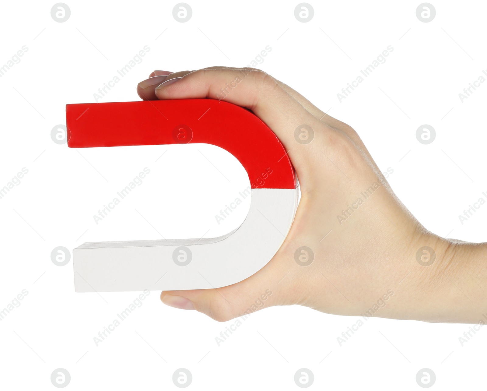 Photo of Woman with horseshoe magnet on white background, closeup