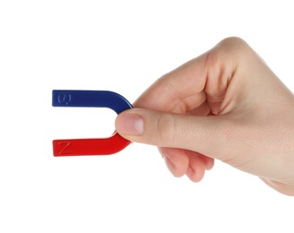 Photo of Woman with horseshoe magnet on white background, closeup