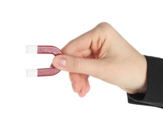 Photo of Woman with horseshoe magnet on white background, closeup