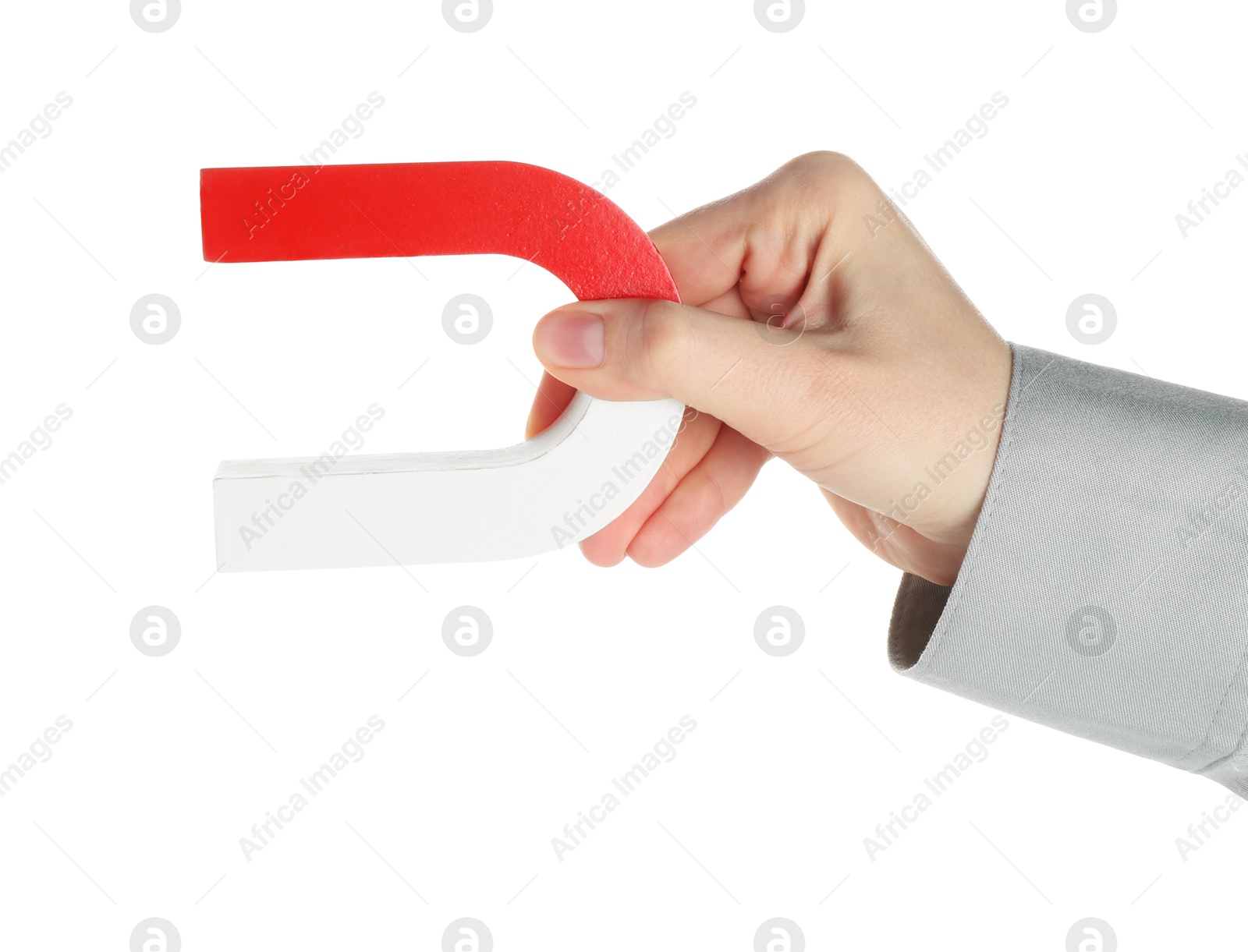 Photo of Woman with horseshoe magnet on white background, closeup