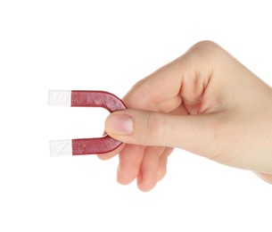 Photo of Woman with horseshoe magnet on white background, closeup