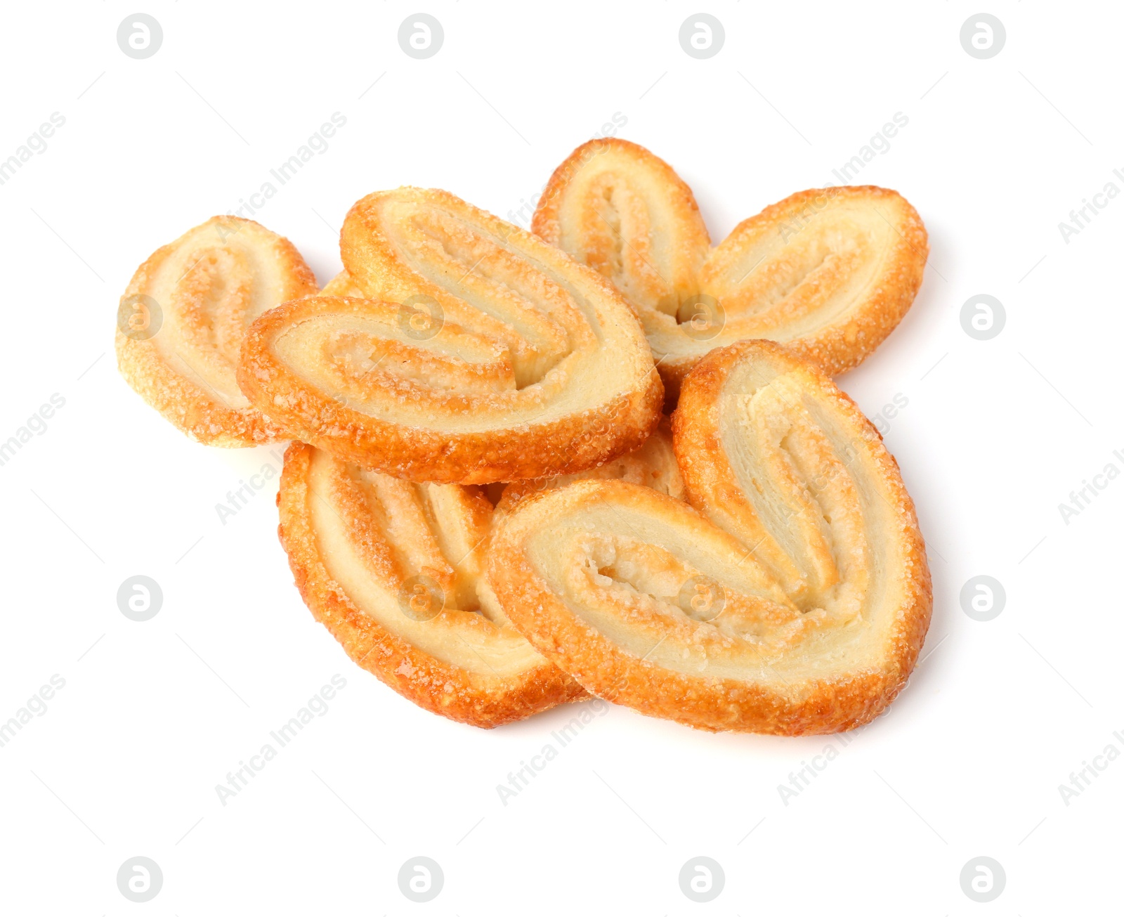 Photo of Tasty french palmier cookies isolated on white, top view