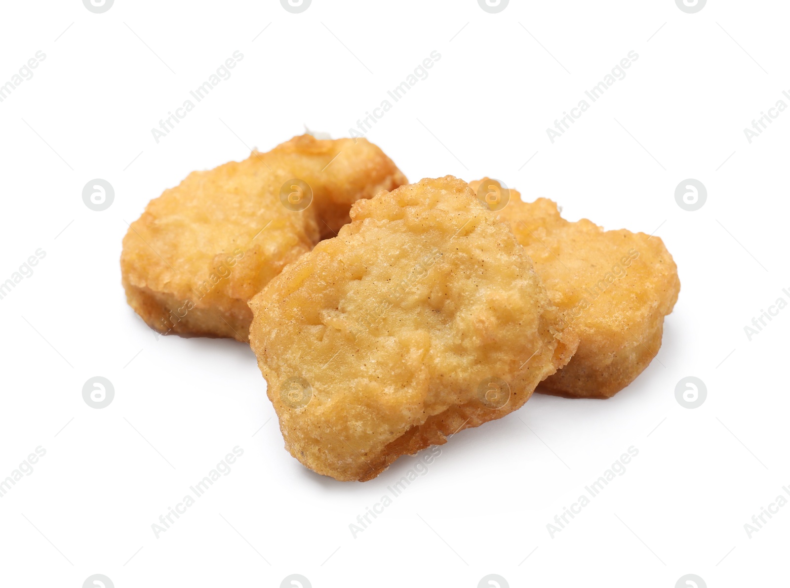 Photo of Delicious fresh chicken nuggets isolated on white