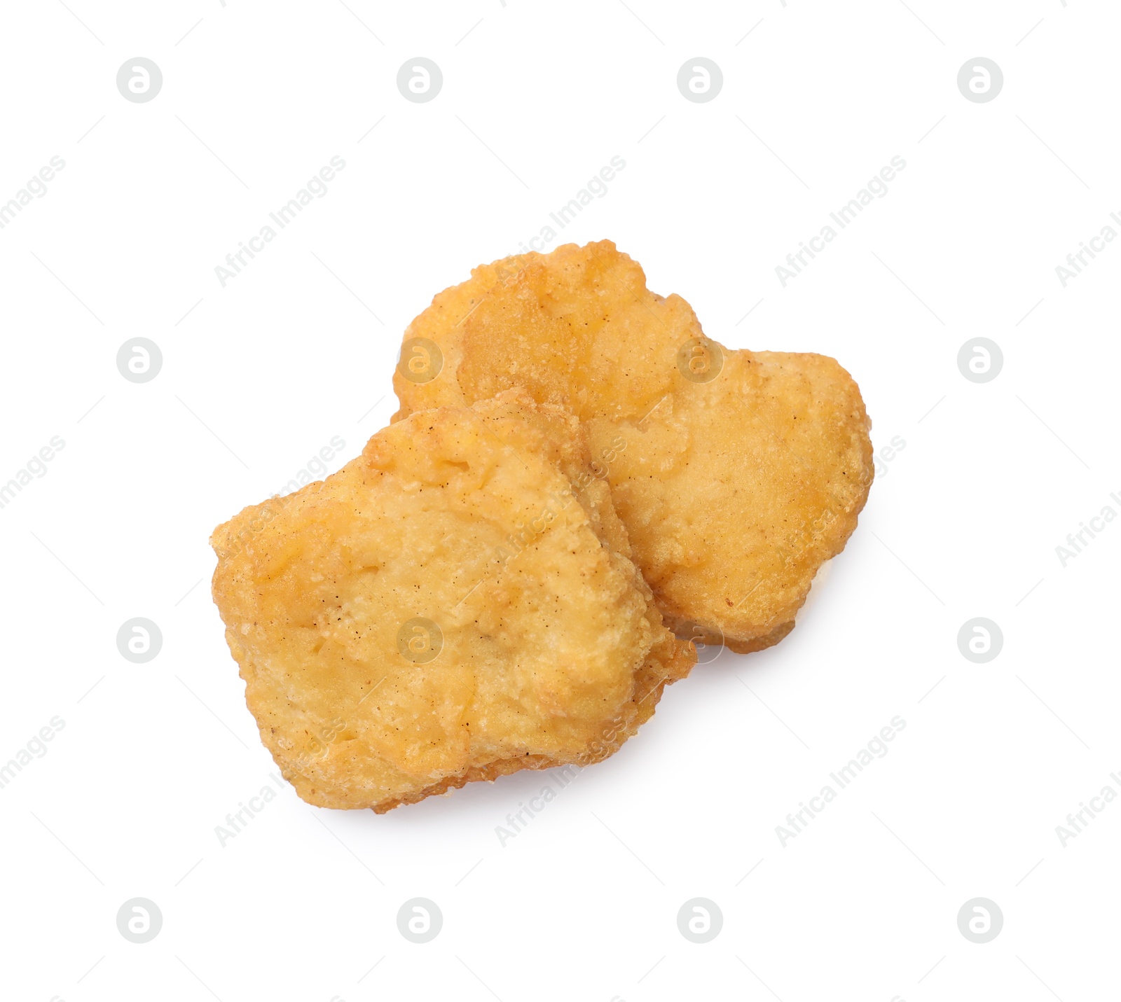 Photo of Delicious chicken nuggets isolated on white, top view