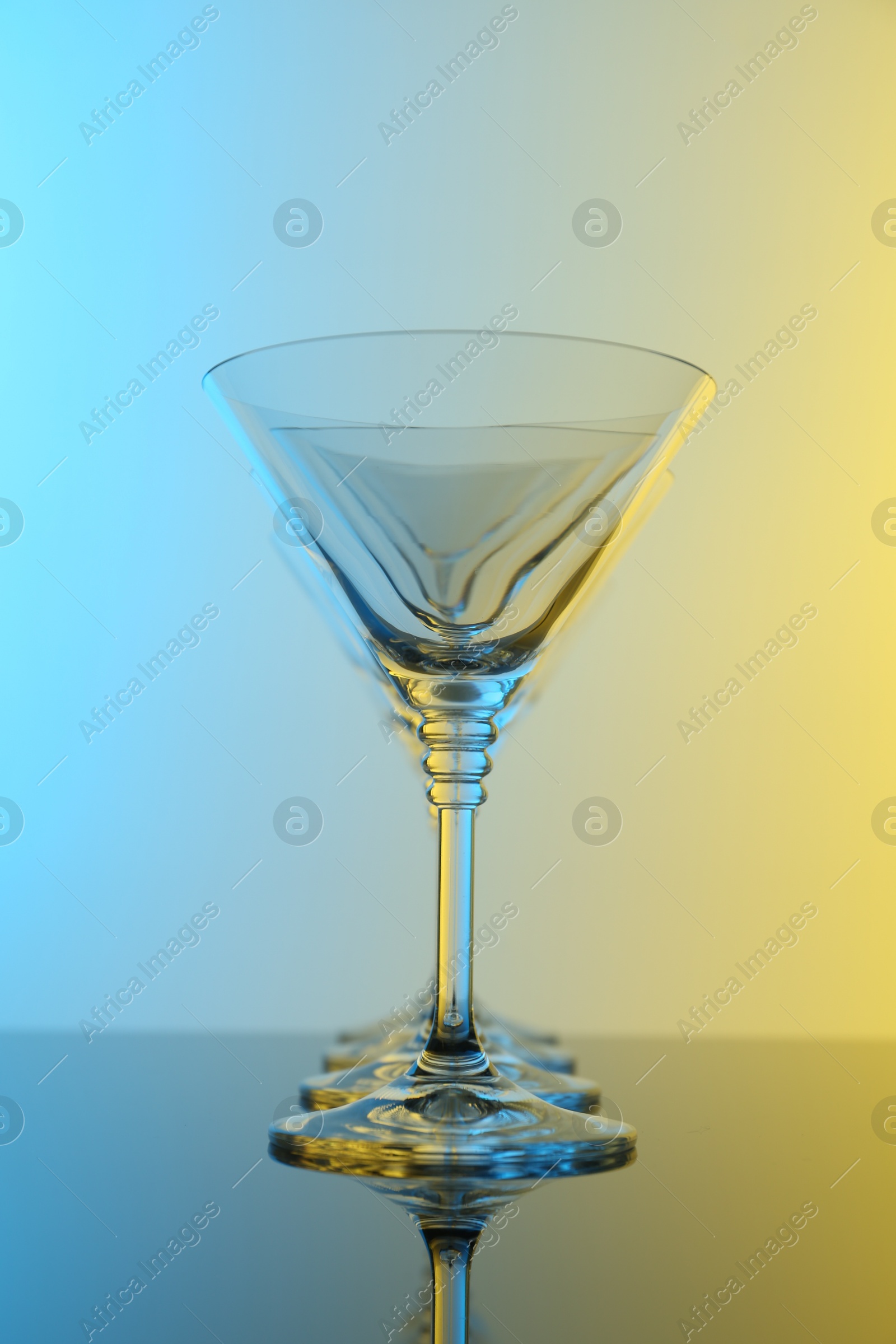 Photo of Empty glasses on table, color tone effect