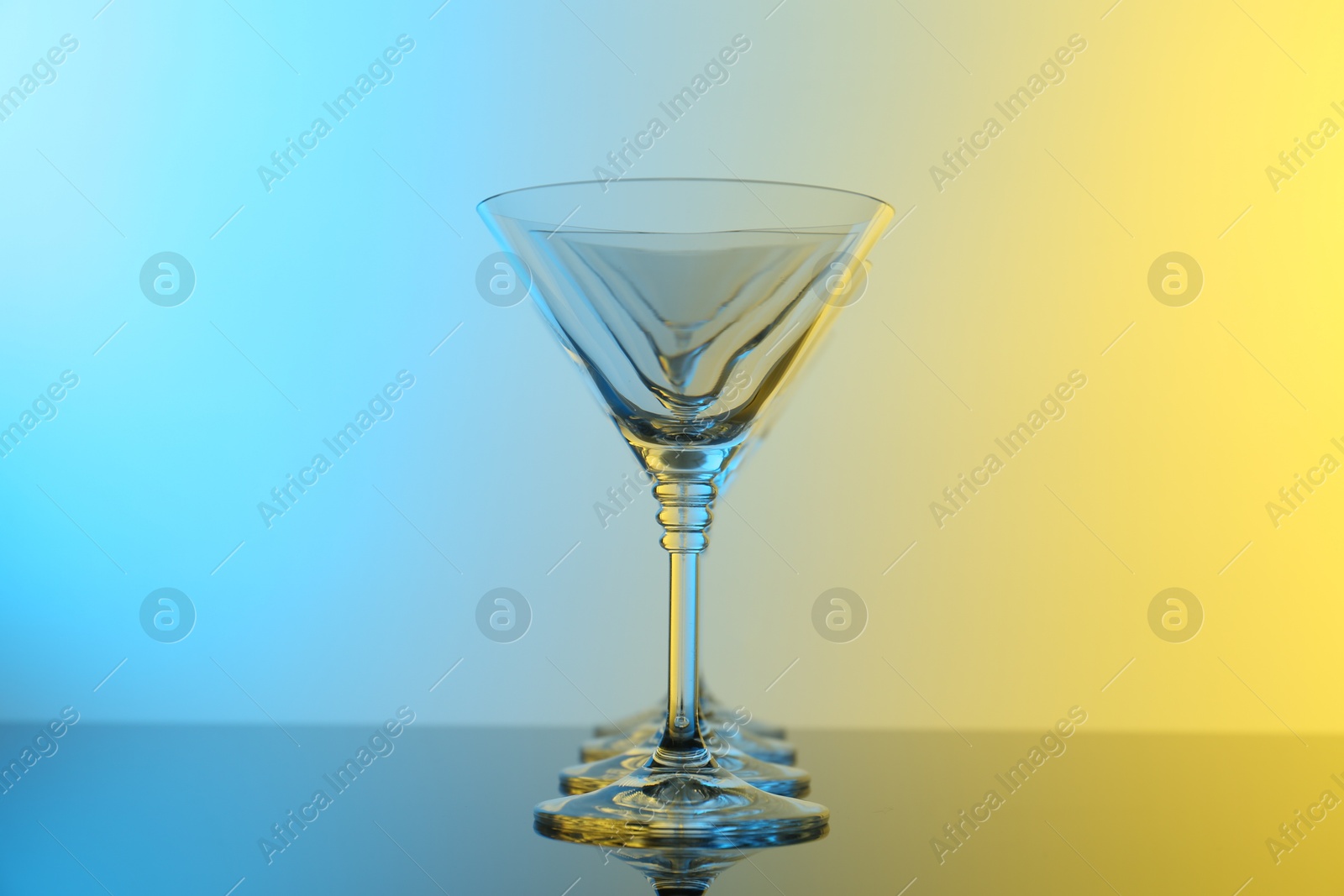 Photo of Empty glasses on table, color tone effect