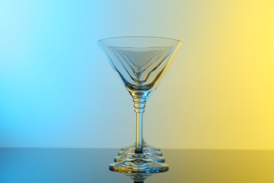 Photo of Empty glasses on table, color tone effect