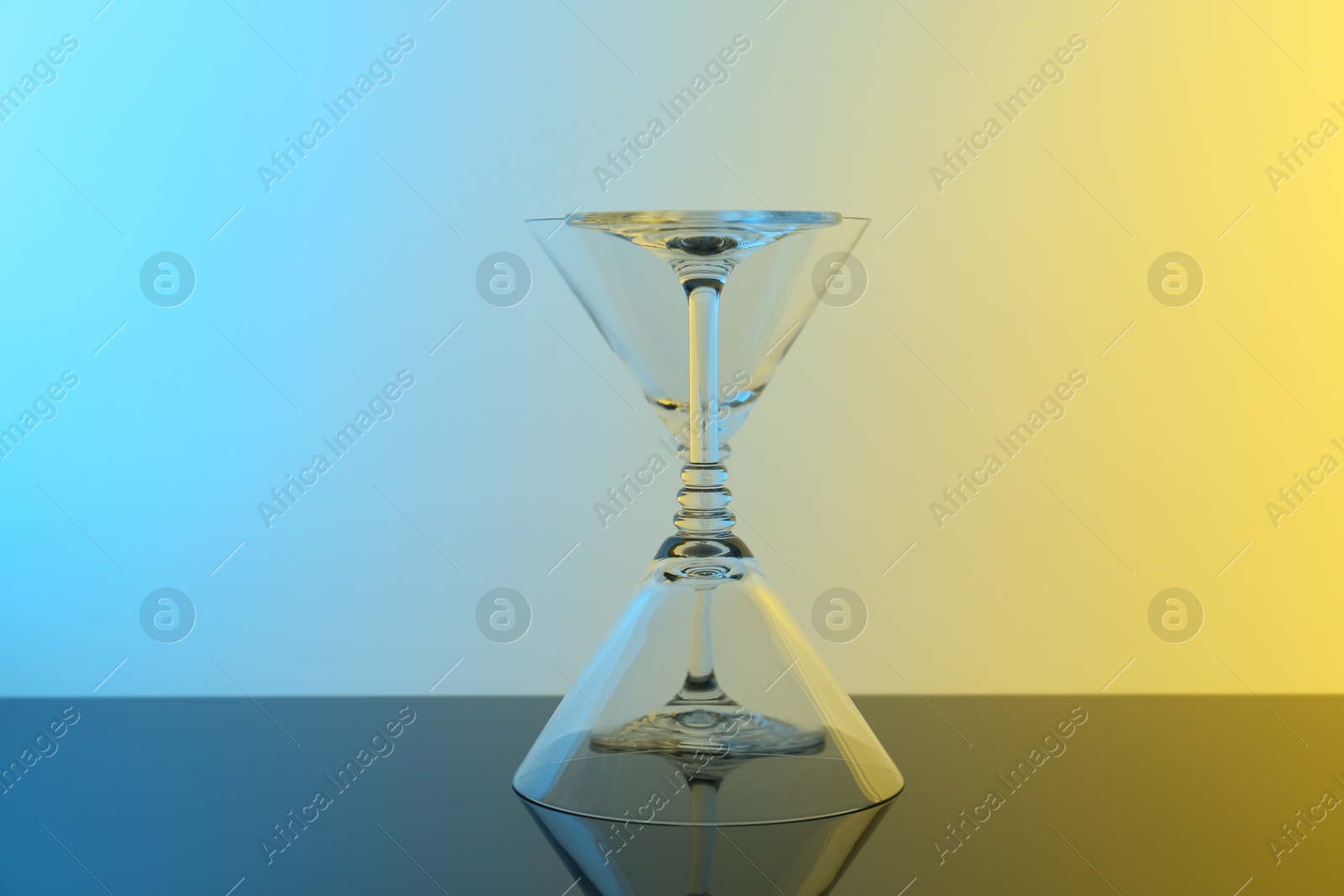 Photo of Empty glasses on table, color tone effect