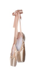 Photo of Pair of beautiful beige pointe shoes isolated on white