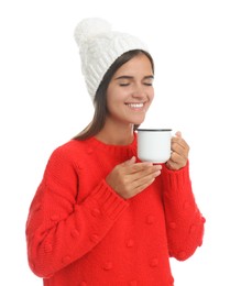 Happy beautiful woman with mug of mulled wine on white background