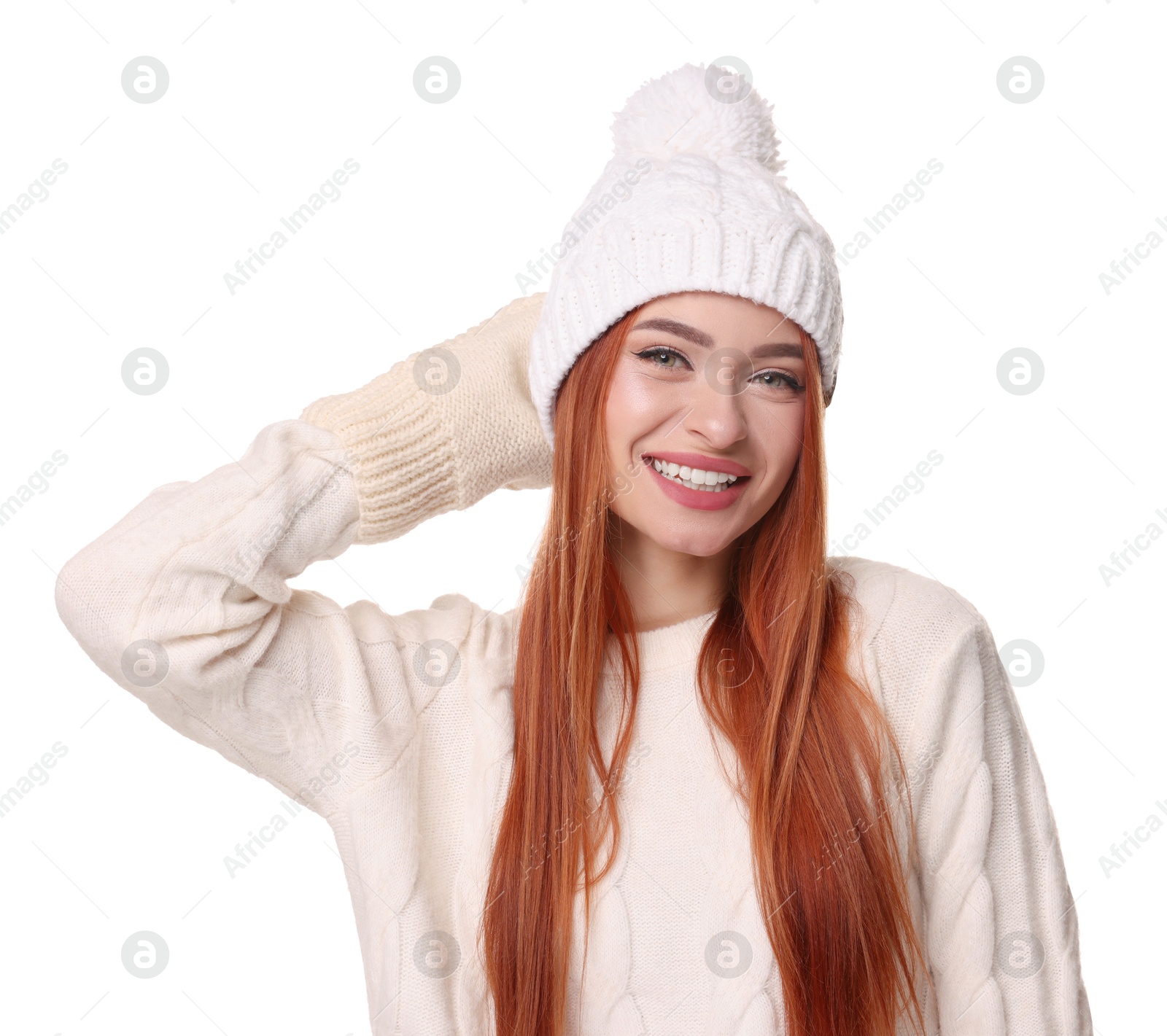 Photo of Young woman in hat and sweater on white background. Christmas celebration