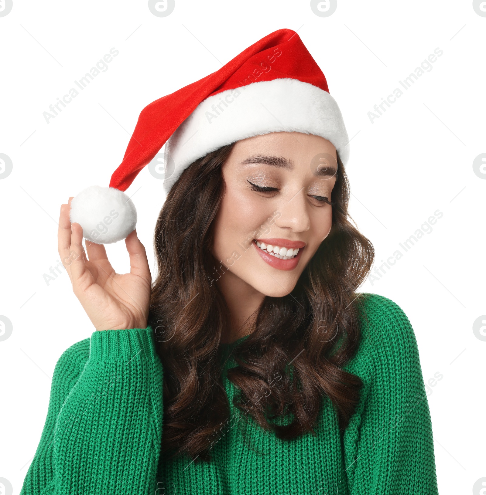 Photo of Christmas celebration. Beautiful young woman in Santa hat isolated on white