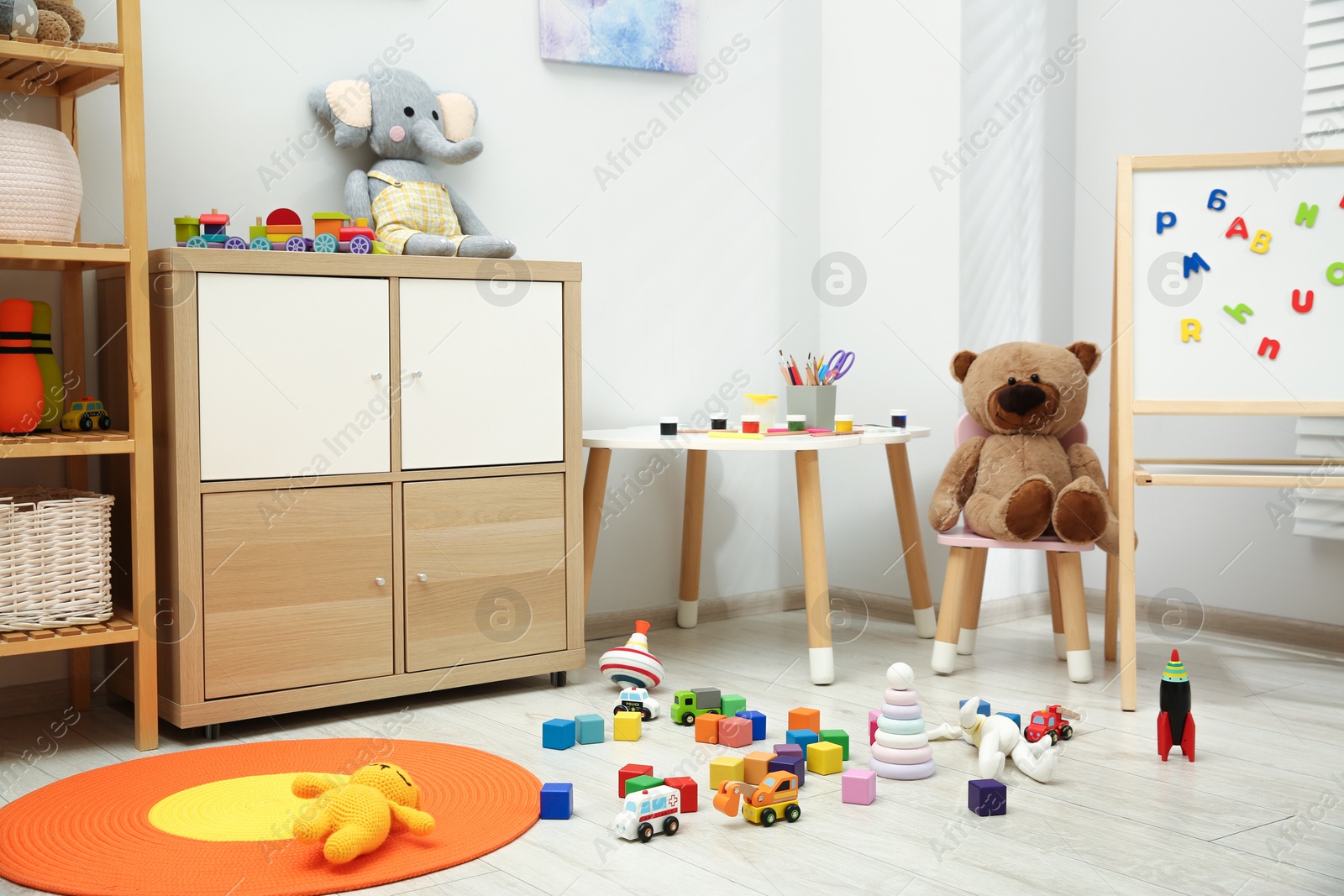 Photo of Child's room interior with many different toys