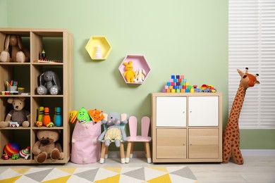 Photo of Child's room interior with many different toys