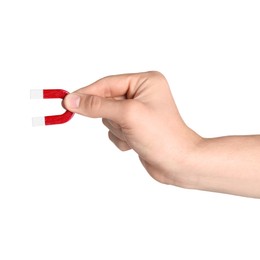 Photo of Man with horseshoe magnet on white background, closeup