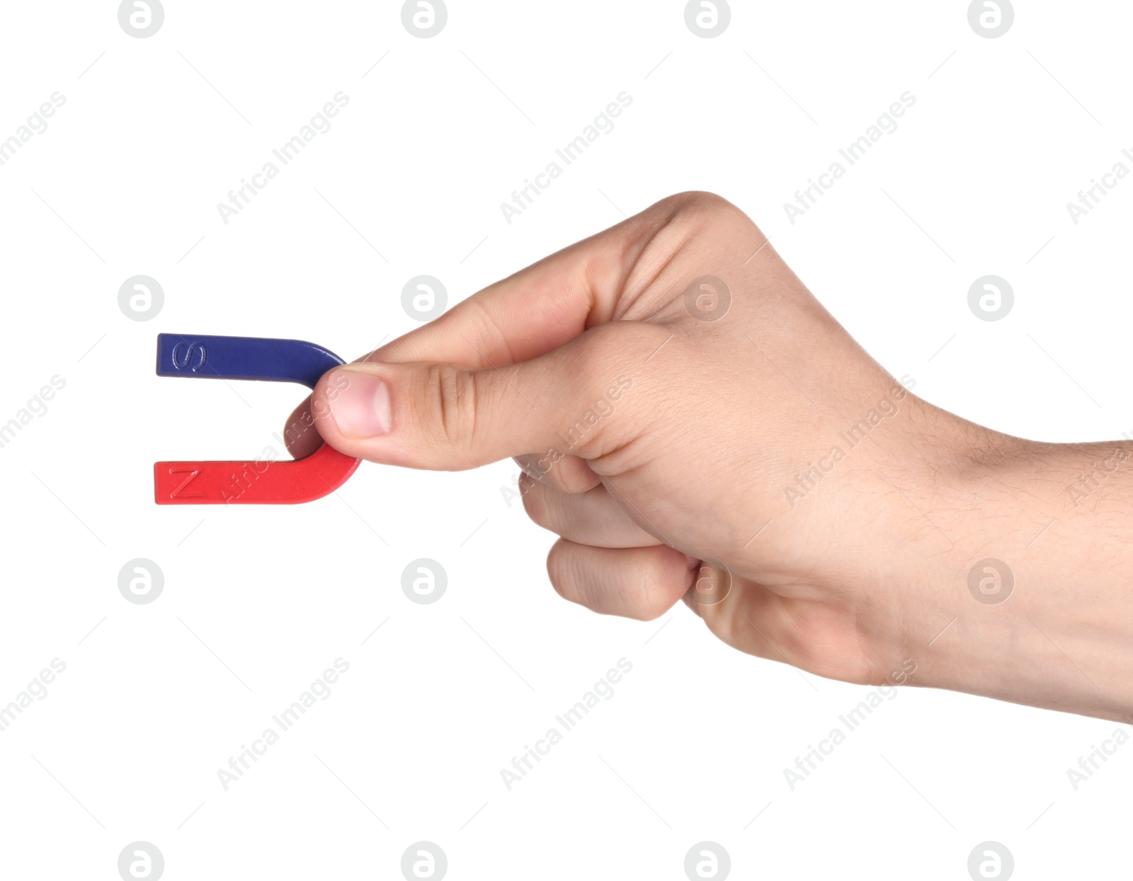 Photo of Man with horseshoe magnet on white background, closeup