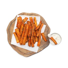 Photo of Delicious sweet potato fries with spices and sauce isolated on white, top view