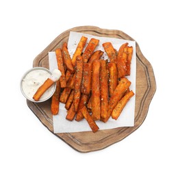 Photo of Delicious sweet potato fries with spices and sauce isolated on white, top view