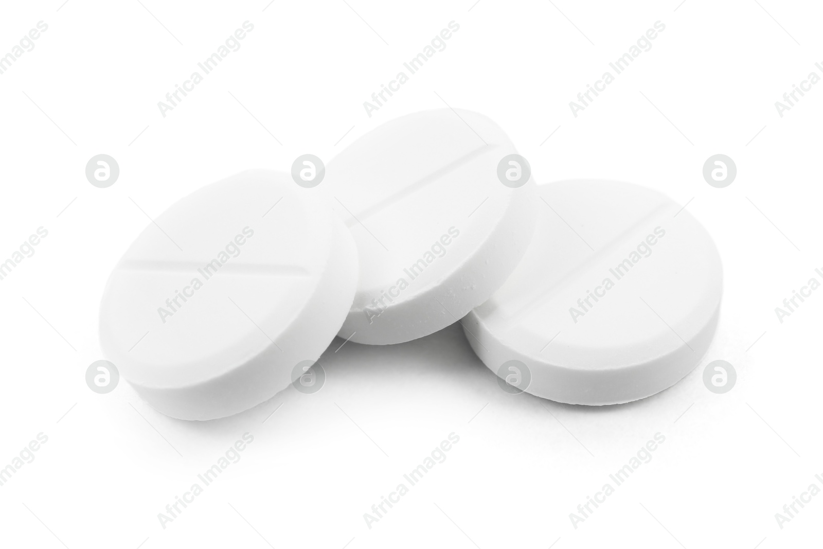 Photo of Antibiotic pills on light grey background, closeup