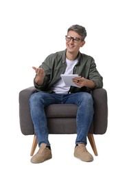 Photo of Professional psychologist with notebook sitting on chair against white background