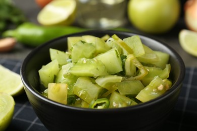 Photo of Delicious salsa (Pico de gallo) in bowl on table, closeup