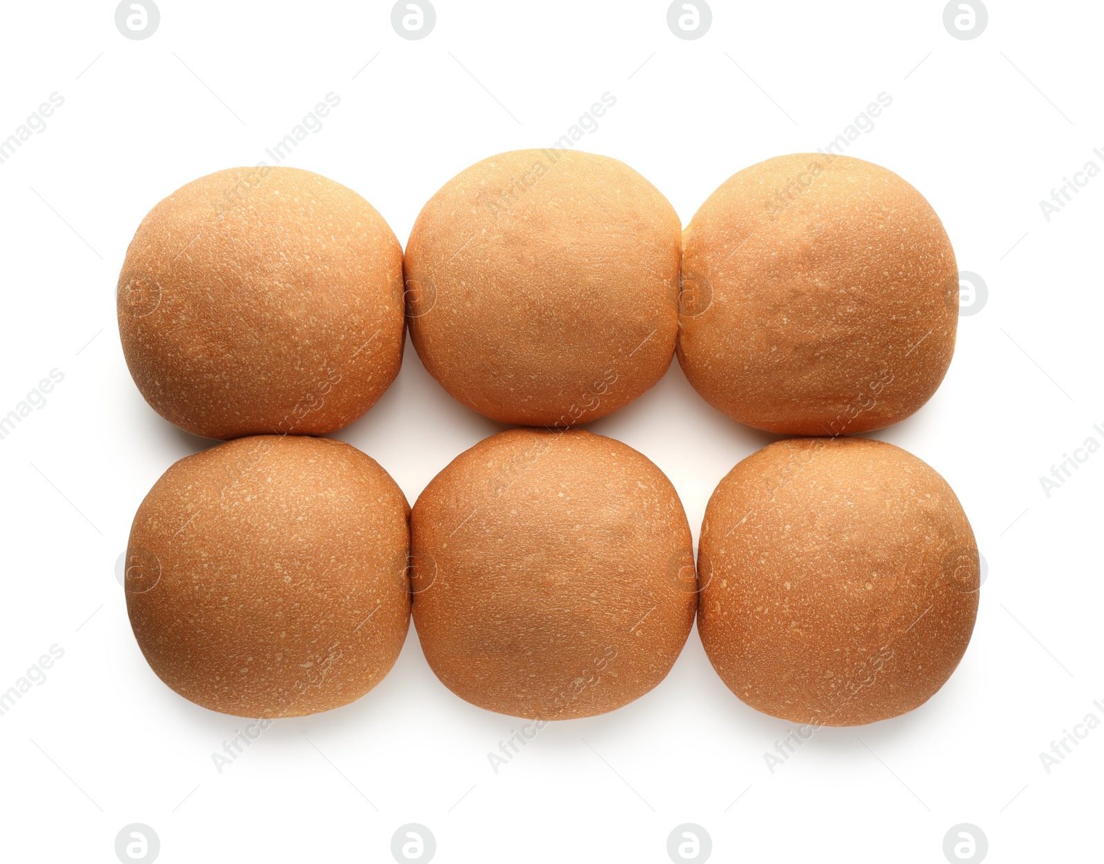 Photo of Many fresh tasty buns isolated on white, top view