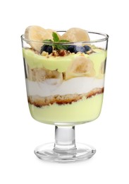 Photo of Tasty trifle dessert. Banana, blueberries, sponge cake and whipped cream in glass isolated on white