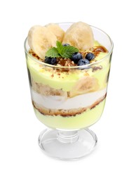 Photo of Tasty trifle dessert. Banana, blueberries, sponge cake and whipped cream in glass isolated on white