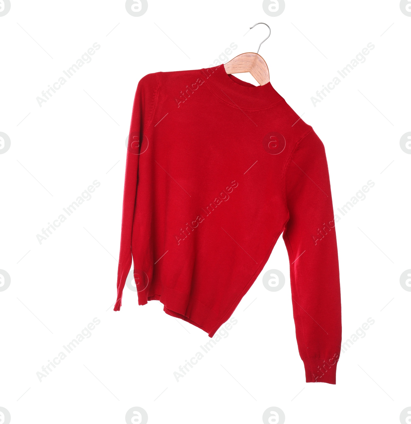 Photo of Woman holding hanger with bright sweater on white background, closeup