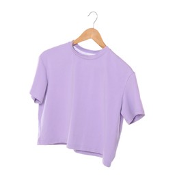 Photo of Woman holding hanger with violet t-shirt on white background, closeup