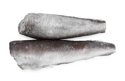 Photo of Two frozen hake fishes isolated on white, top view