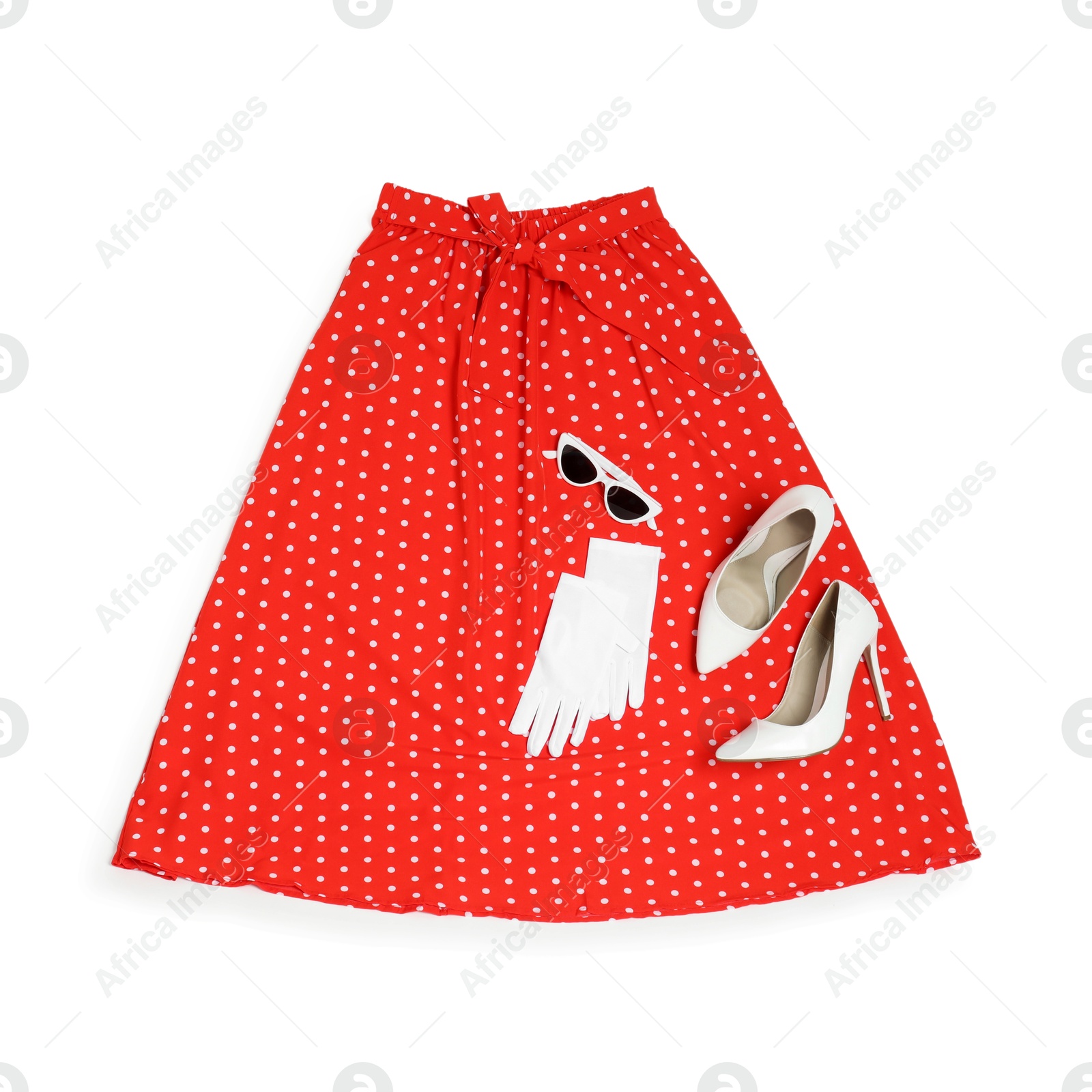 Photo of Retro styled outfit on white background, flat lay