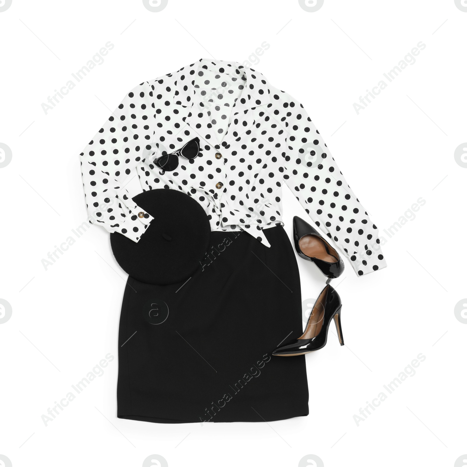 Photo of Retro styled outfit on white background, flat lay