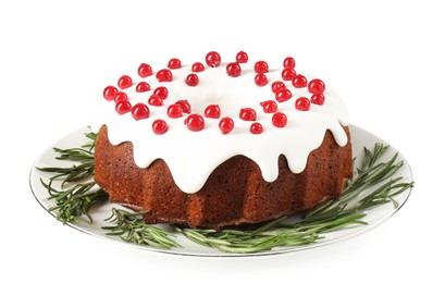 Photo of Tasty Christmas cake with red currants and rosemary isolated on white