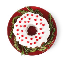 Photo of Tasty Christmas cake with red currants and rosemary isolated on white, top view