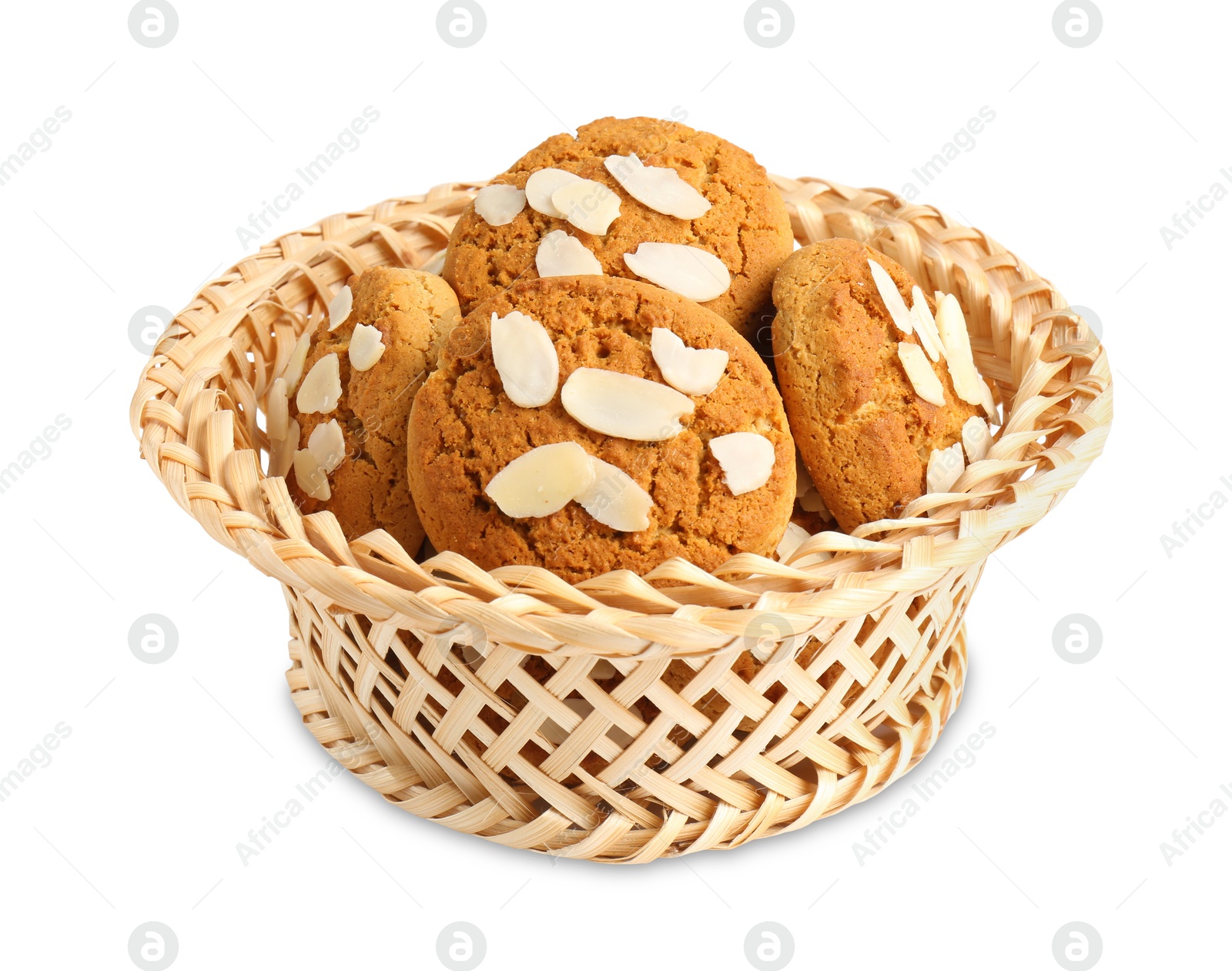 Photo of Tasty cookies with almond flakes in wicker basket isolated on white