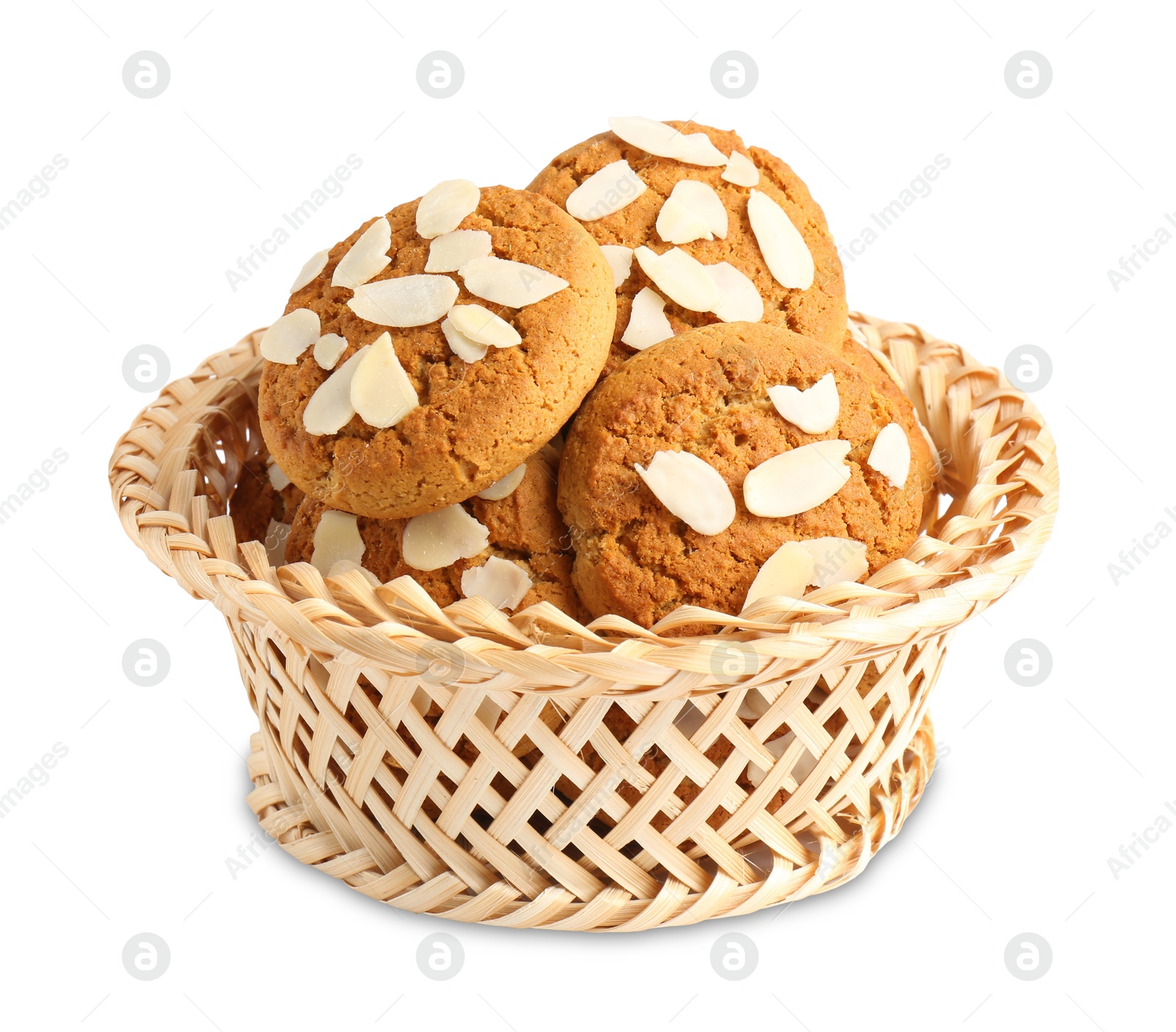 Photo of Tasty cookies with almond flakes in wicker basket isolated on white