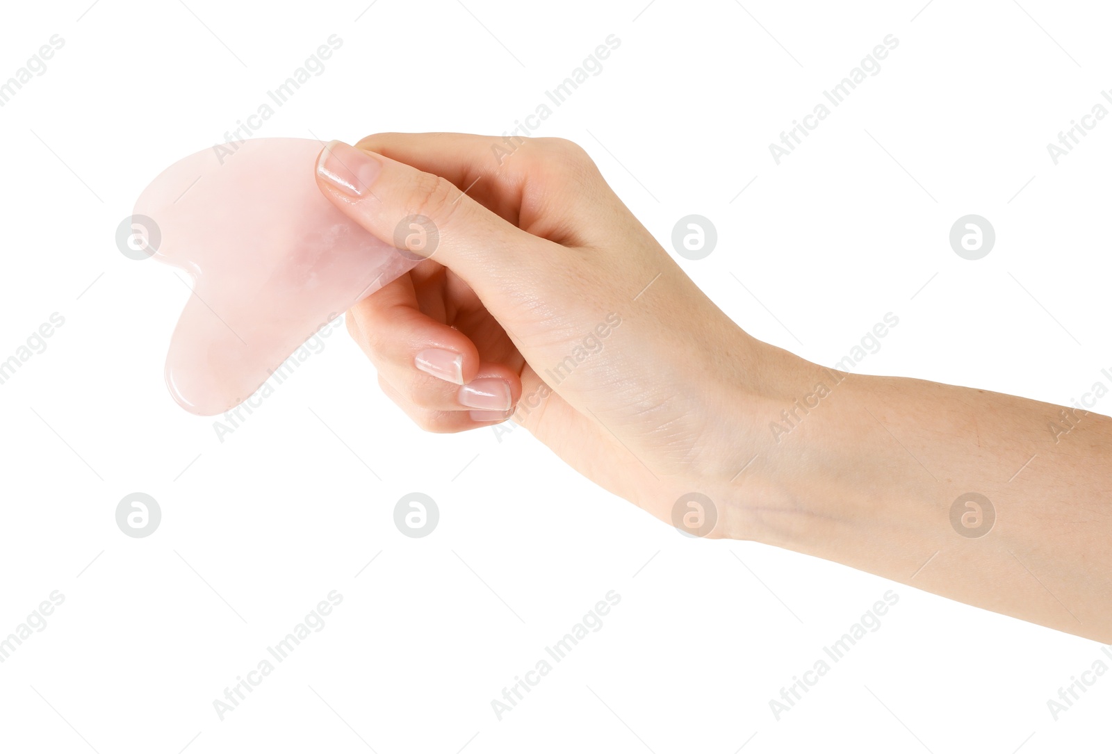 Photo of Woman holding gua sha tool on white background, closeup