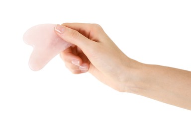 Photo of Woman holding gua sha tool on white background, closeup