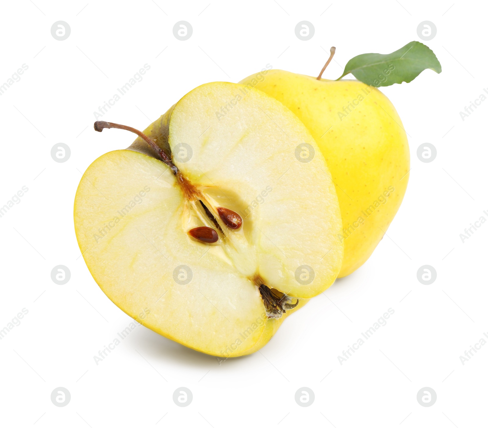 Photo of Whole and cut ripe yellow apples isolated on white