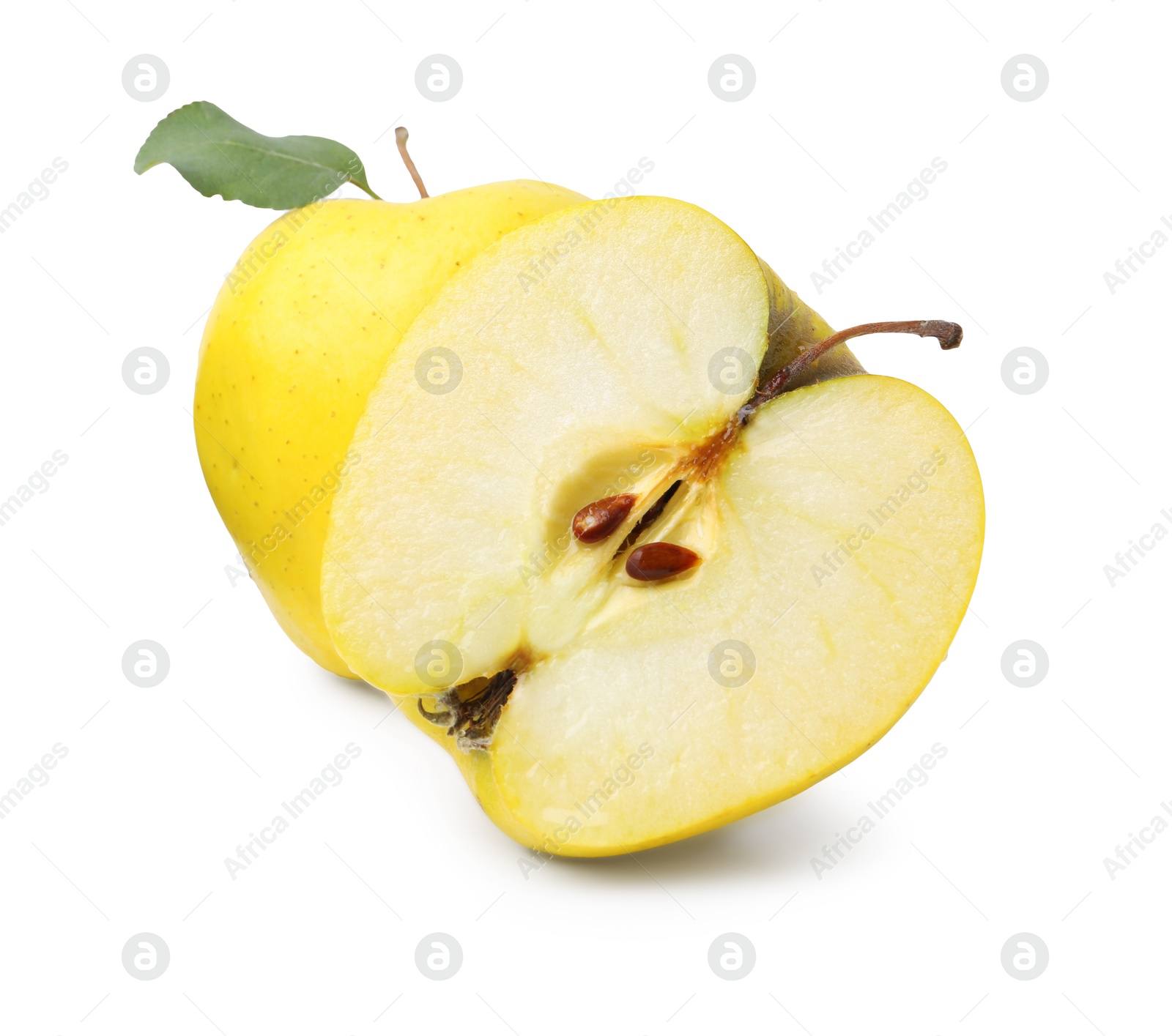 Photo of Whole and cut ripe yellow apples isolated on white