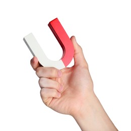 Photo of Man with horseshoe magnet on white background, closeup