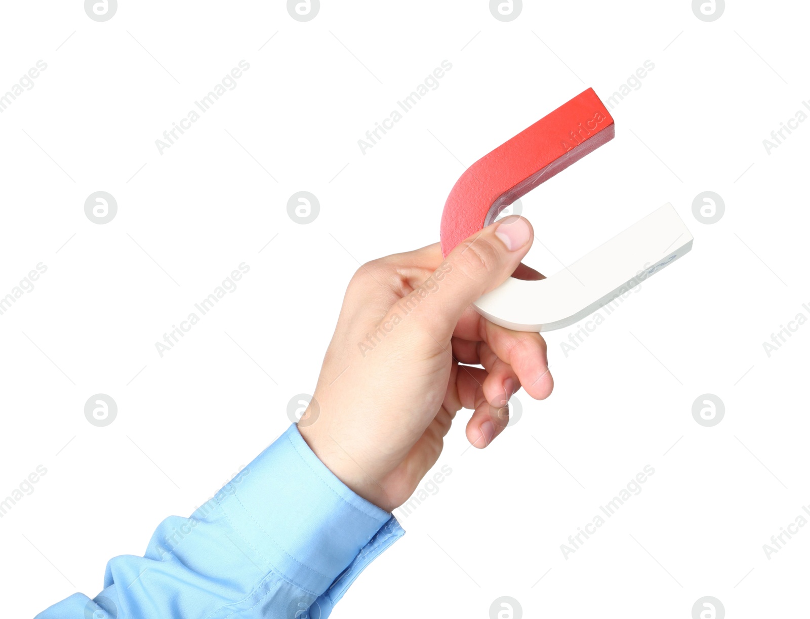 Photo of Man with horseshoe magnet on white background, closeup